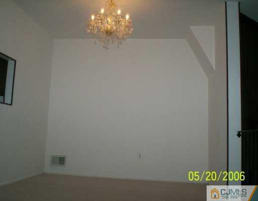 436 Middlewood Road Middletown, NJ 07748 - Photo 4 of 4 a view of a door in the hallway