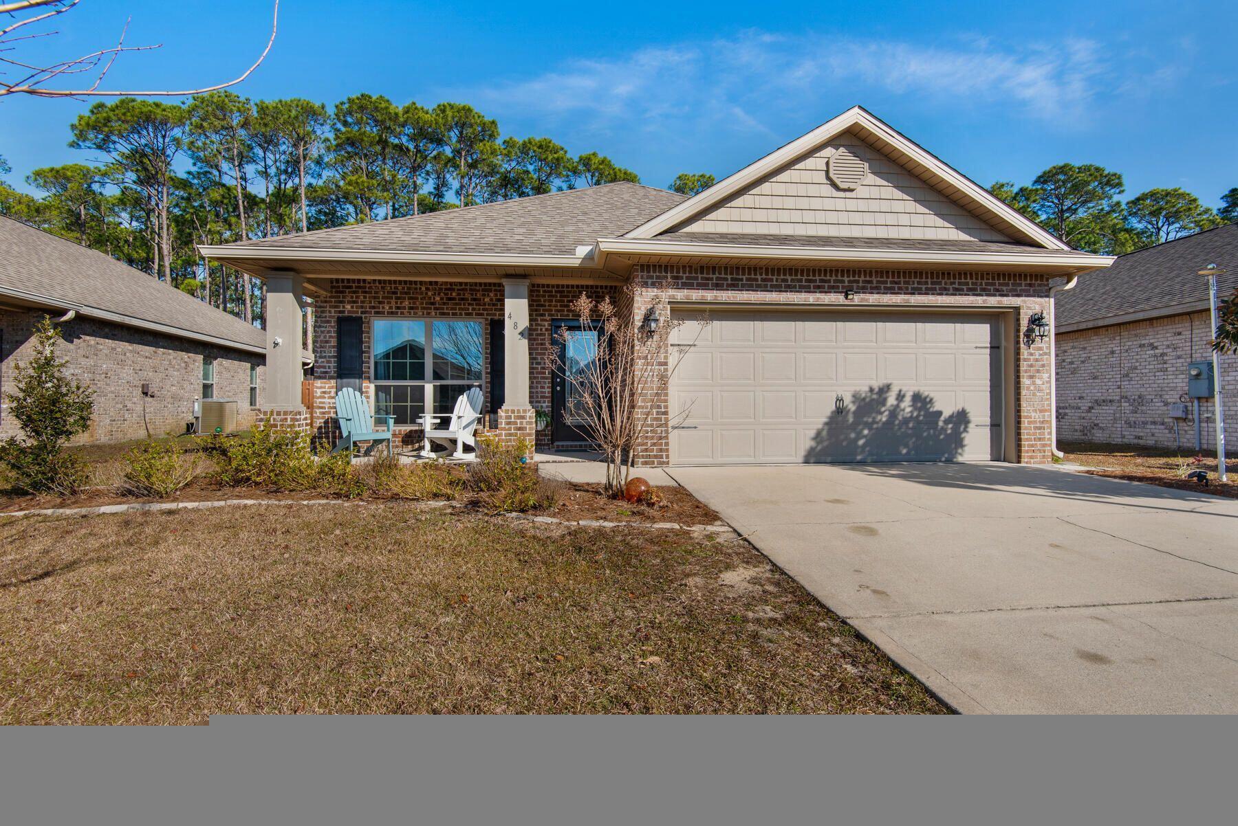 482 Cocobolo Drive Santa Rosa Beach, FL 32459 - Photo 1 of 1 front view of a house with a porch