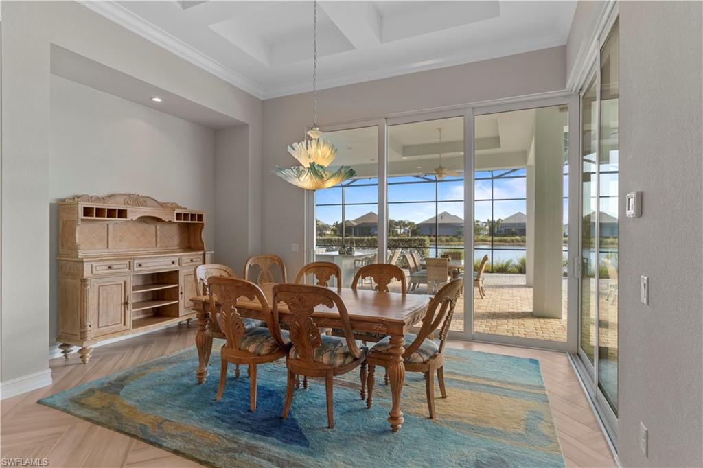 6254 Lightbourn Way Naples, FL 34113 - Photo 20 of 34 a view of a dining room with furniture window and outside view
