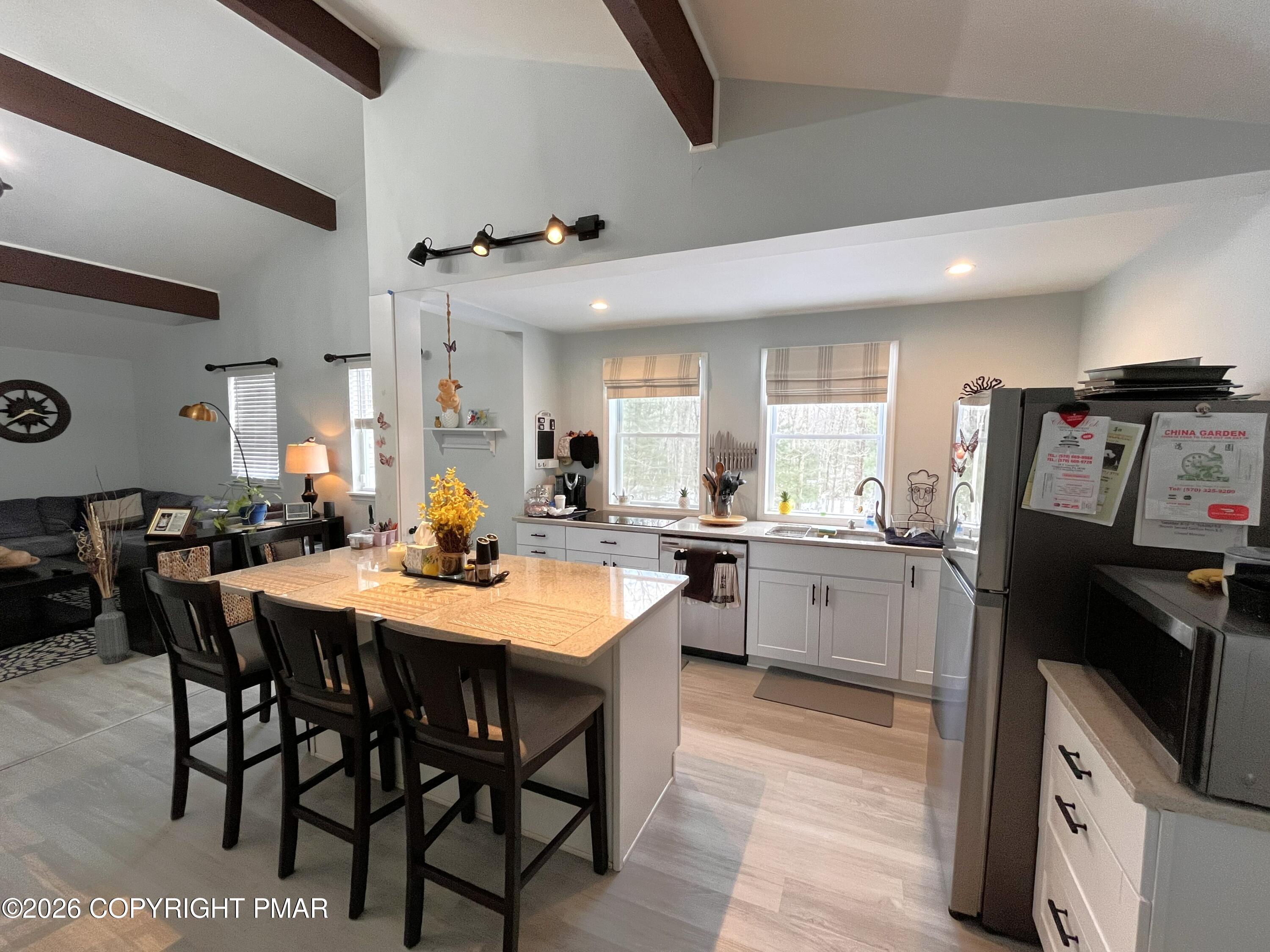 29 Hopi Road Jim Thorpe, PA 18229 - Photo 12 of 44 a large kitchen with a table and chairs