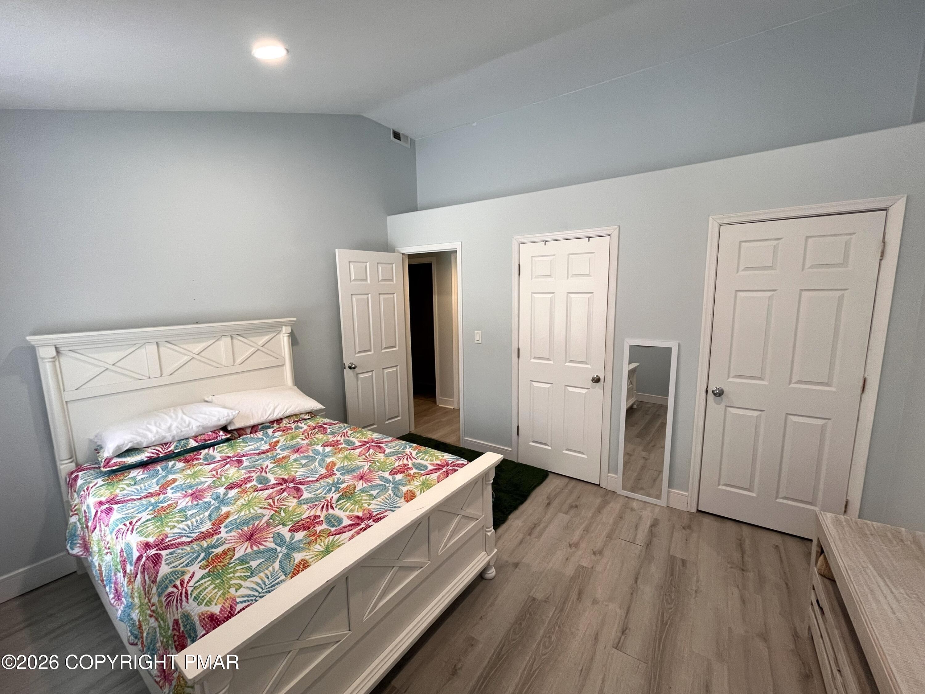 29 Hopi Road Jim Thorpe, PA 18229 - Photo 29 of 44 a bedroom with a bed and a table