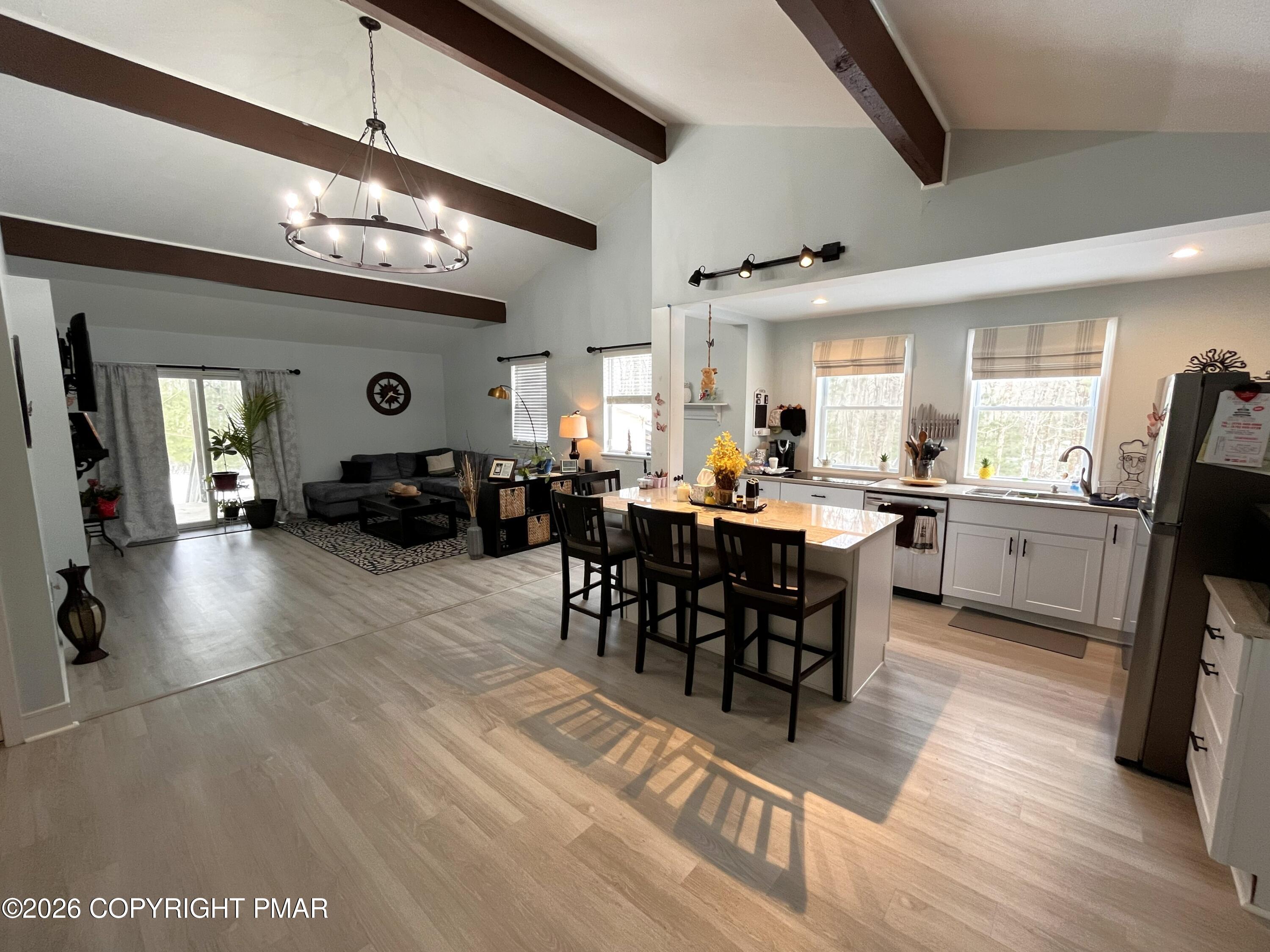 29 Hopi Road Jim Thorpe, PA 18229 - Photo 3 of 44 a large kitchen with a table and chairs in it