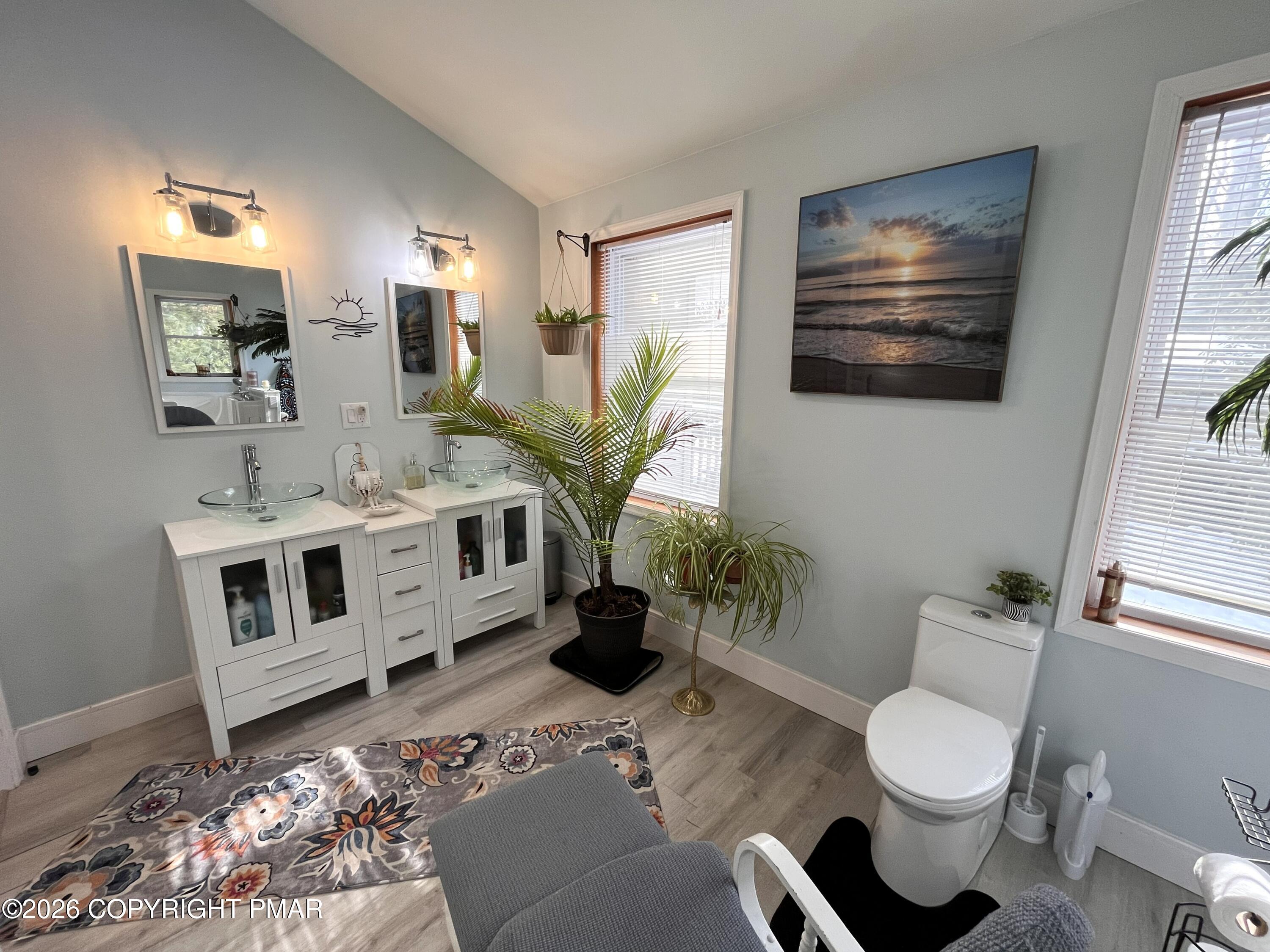 29 Hopi Road Jim Thorpe, PA 18229 - Photo 31 of 44 a bathroom with a toilet a sink and mirror