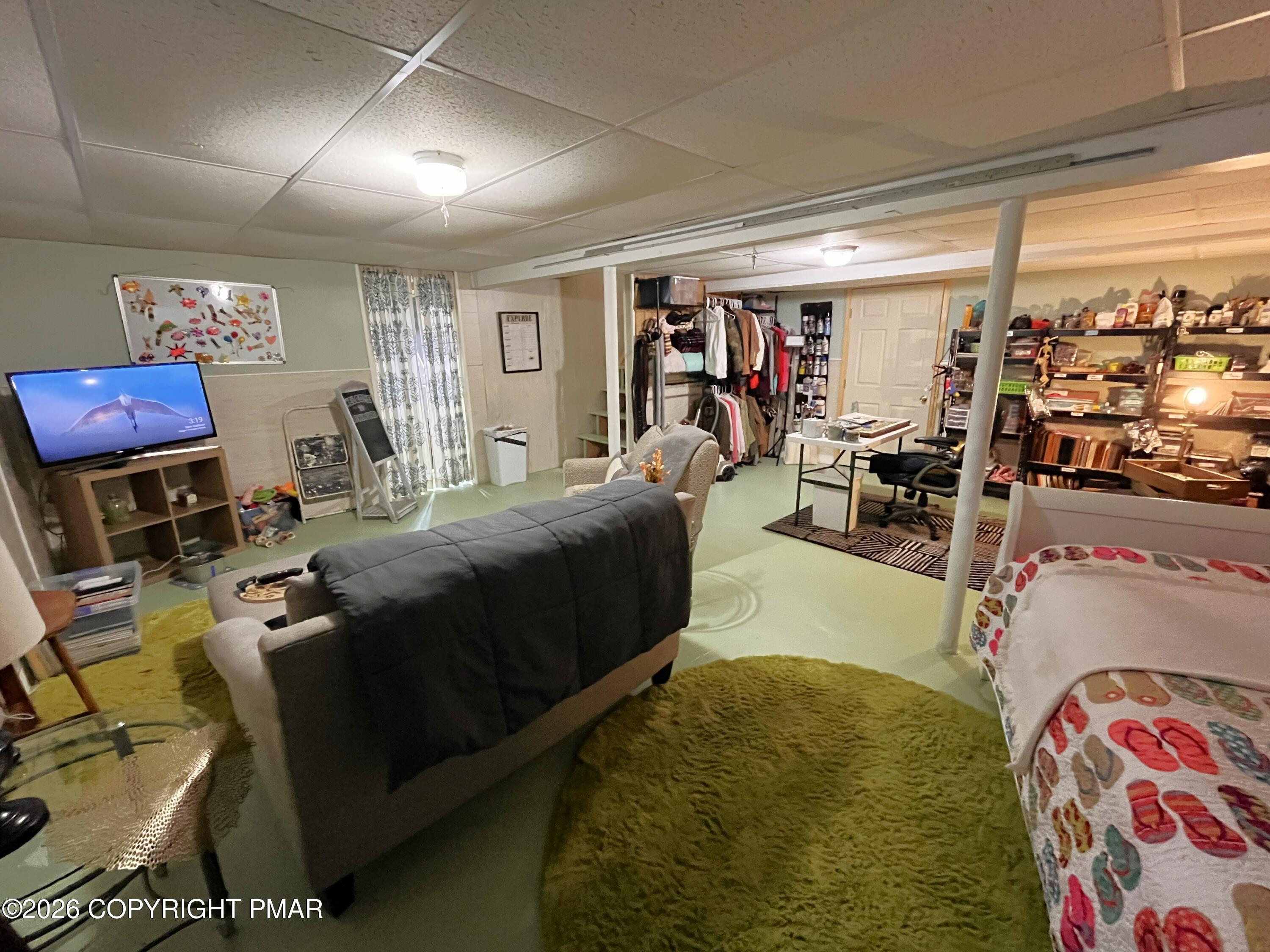 29 Hopi Road Jim Thorpe, PA 18229 - Photo 33 of 44 a living room with furniture and a flat screen tv