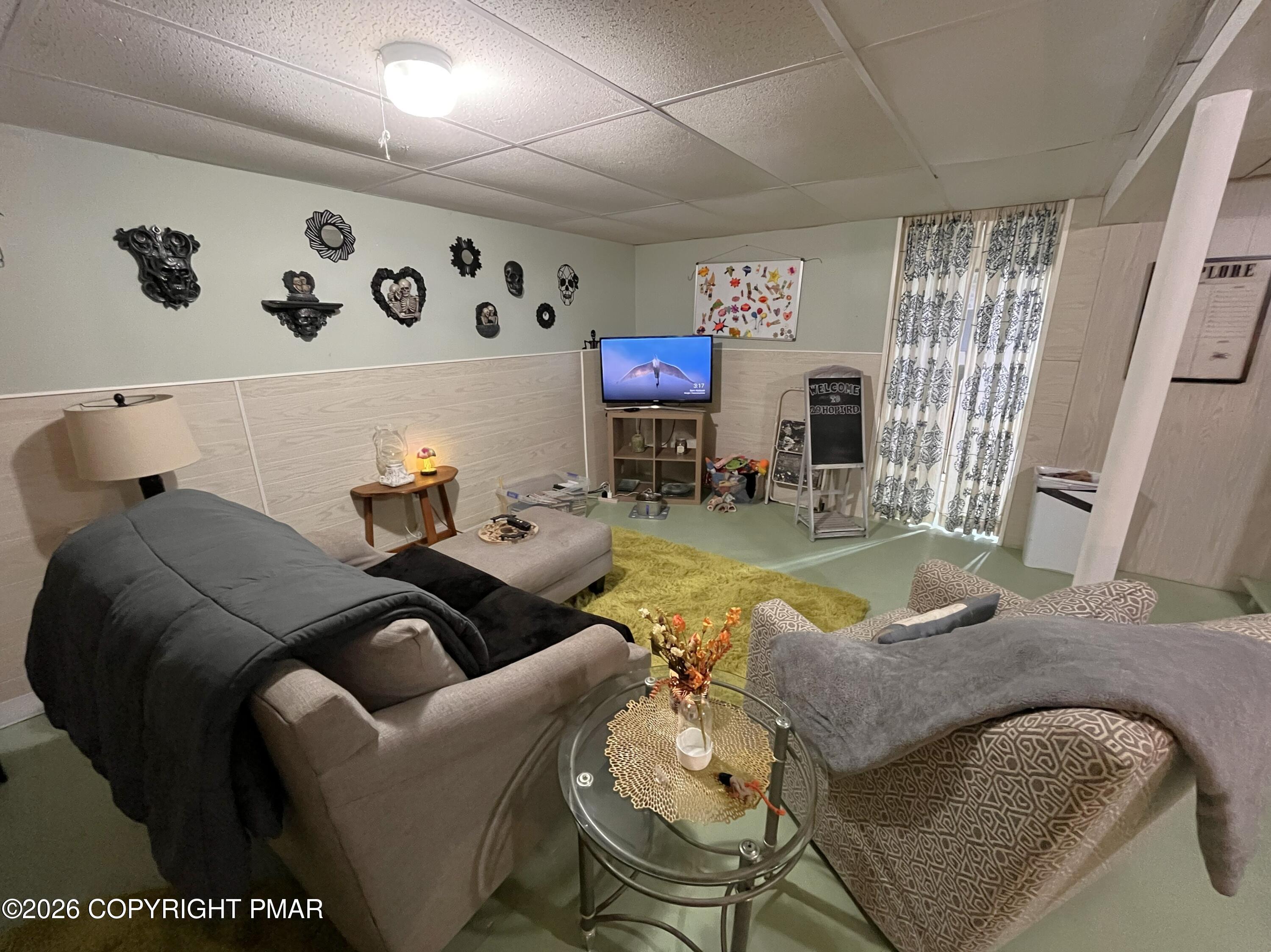 29 Hopi Road Jim Thorpe, PA 18229 - Photo 34 of 44 a living room with furniture and a flat screen tv