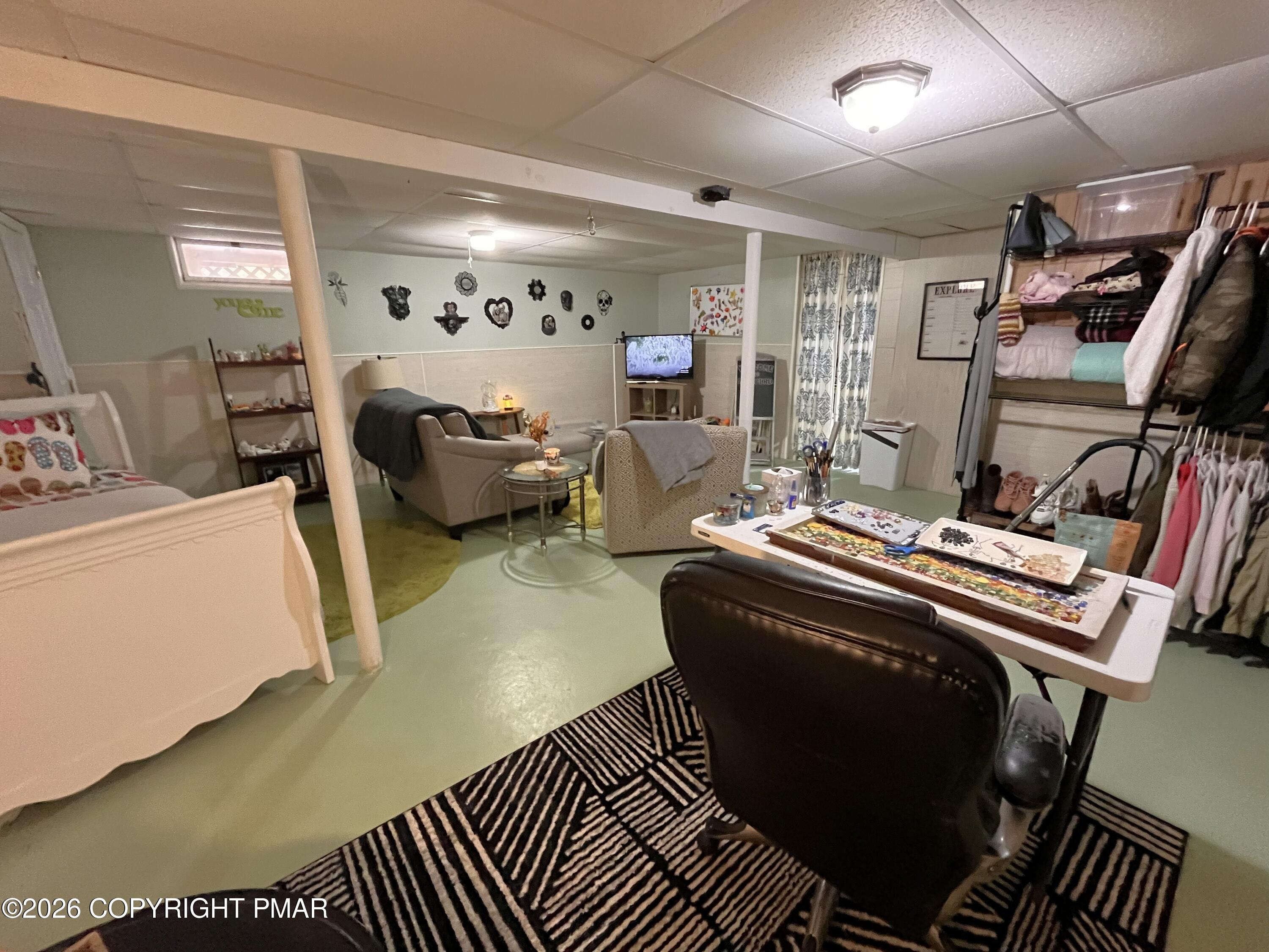 29 Hopi Road Jim Thorpe, PA 18229 - Photo 38 of 44 a living room with furniture and a flat screen tv