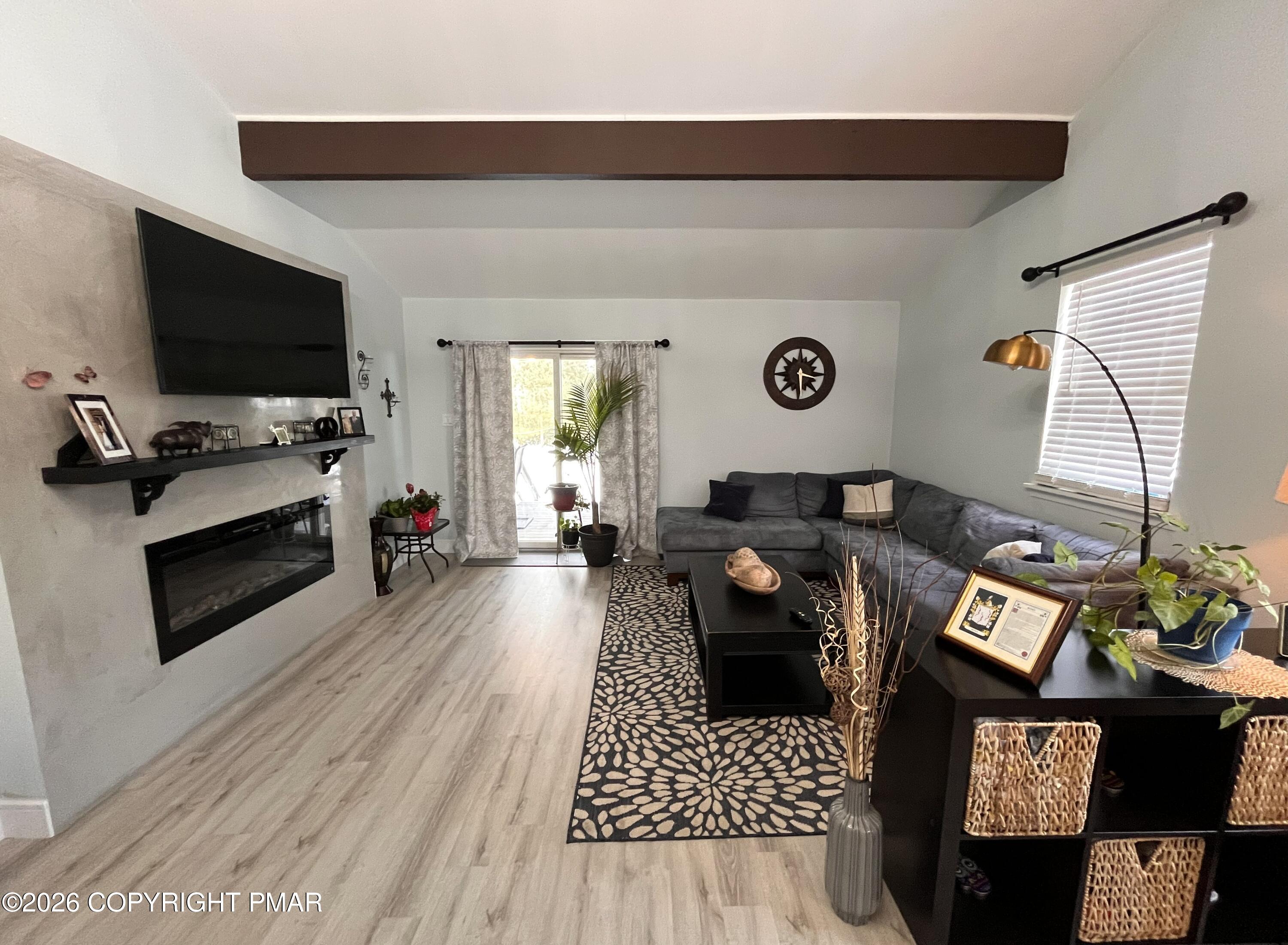 29 Hopi Road Jim Thorpe, PA 18229 - Photo 4 of 44 a living room with furniture and a flat screen tv