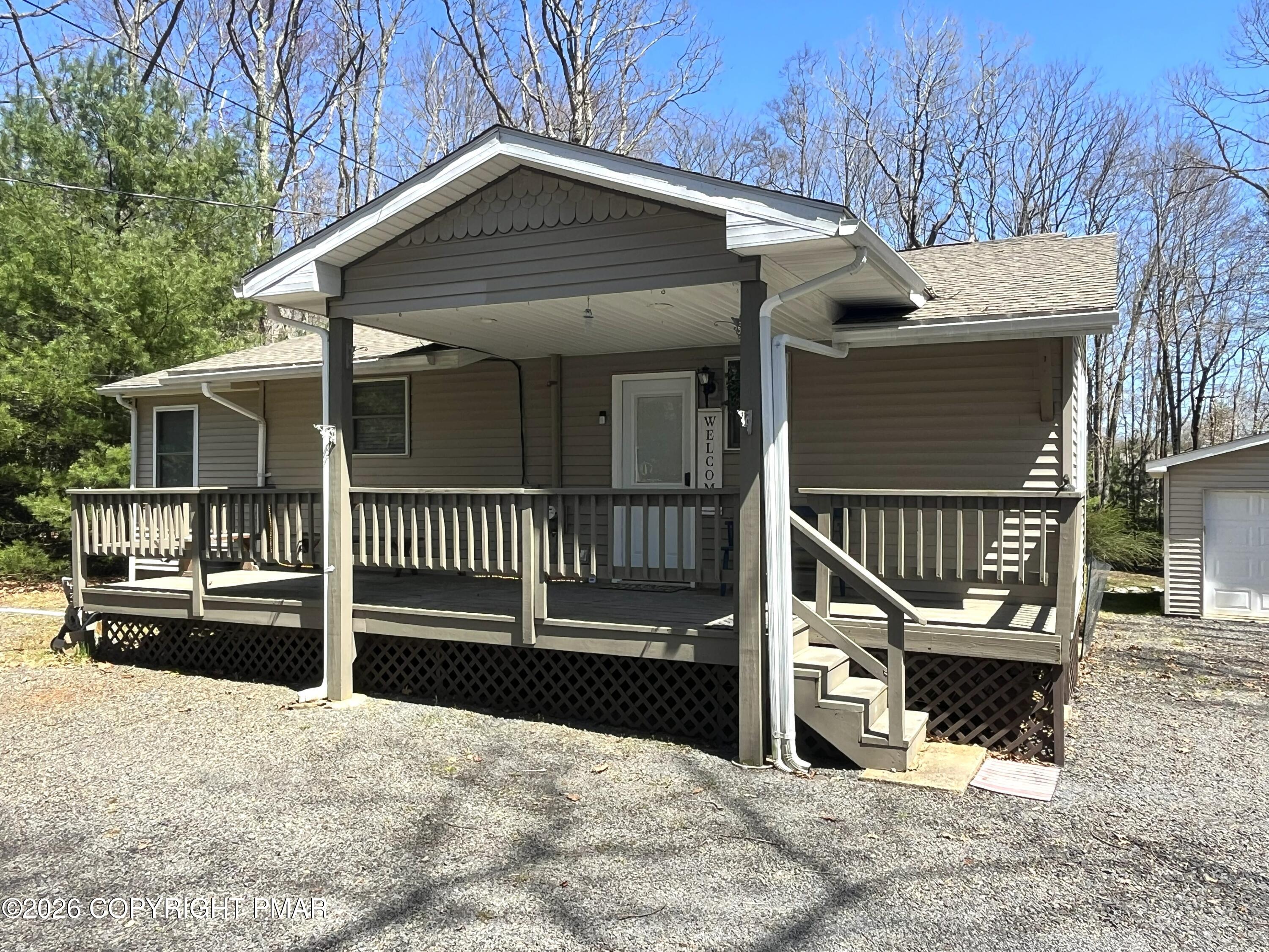 29 Hopi Road Jim Thorpe, PA 18229 - Photo 8 of 44 a view of a house with a wooden fence