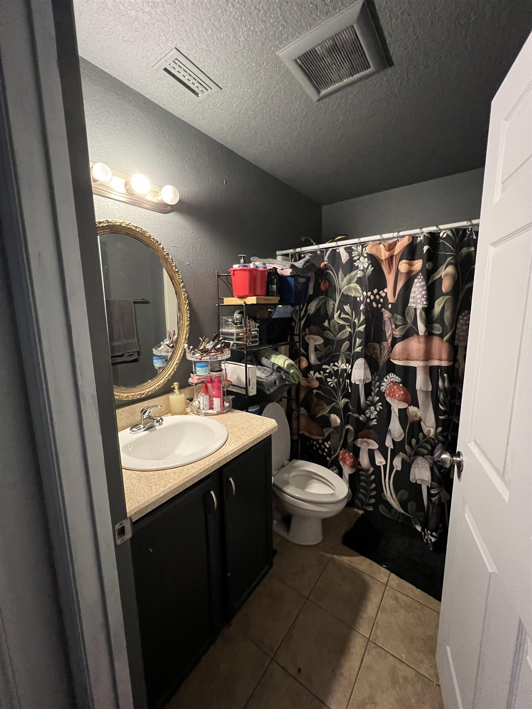 921 Avery Street St. Augustine, FL 32084 - Photo 16 of 29 a bathroom with a sink toilet and shower