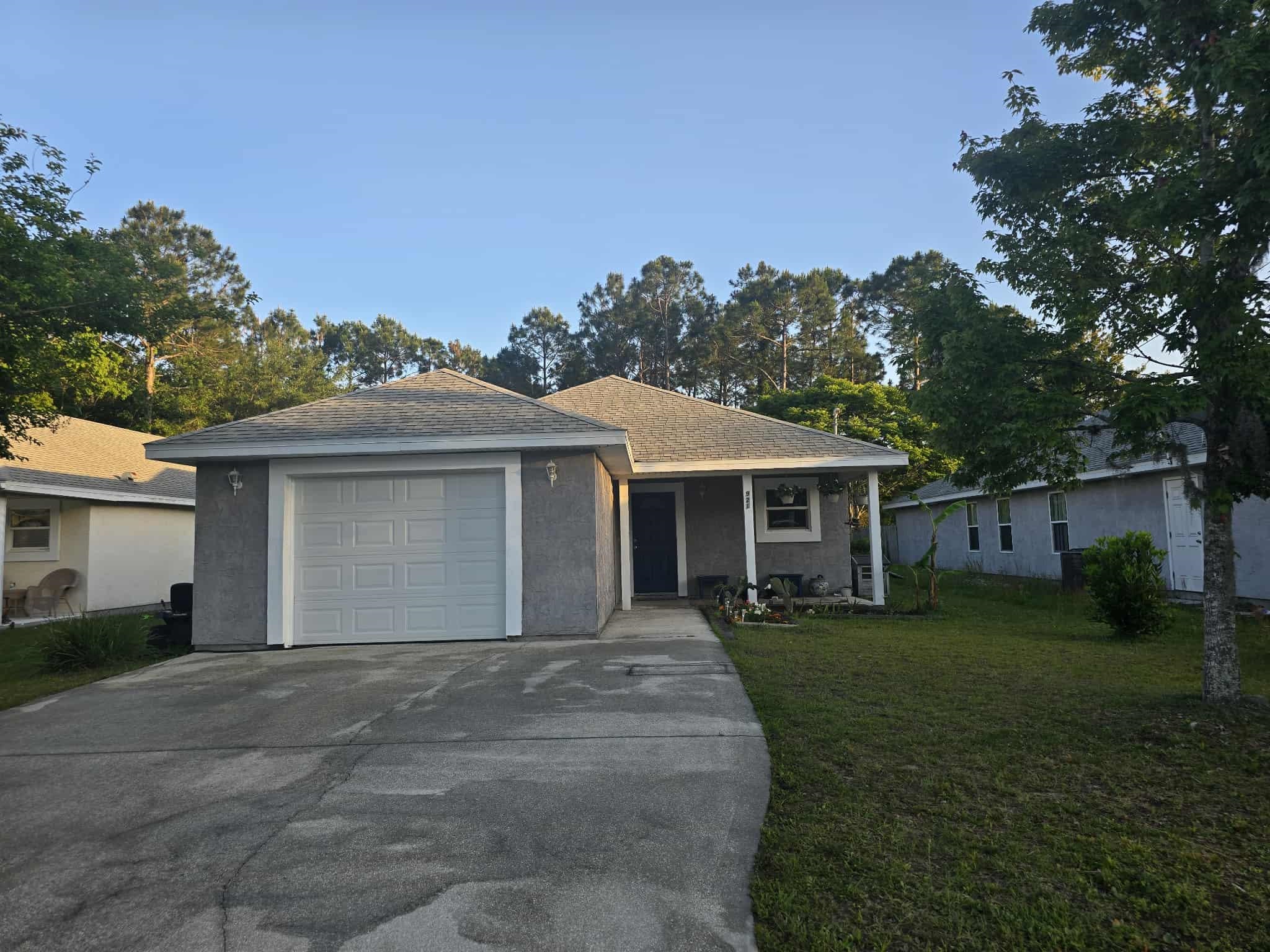 921 Avery Street St. Augustine, FL 32084 - Photo 2 of 29 a front view of house with yard and green space