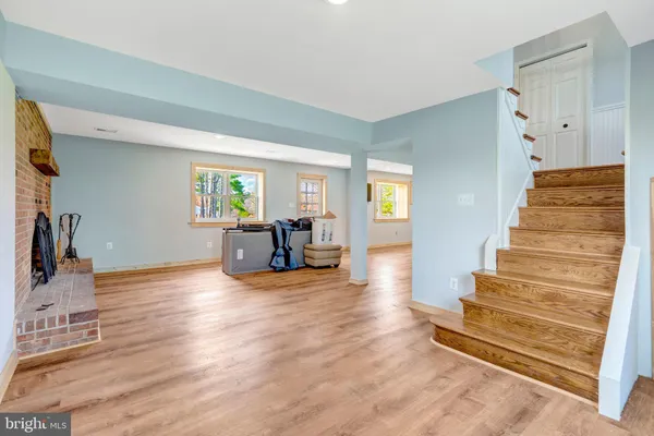a view of livingroom with hardwood and furniture