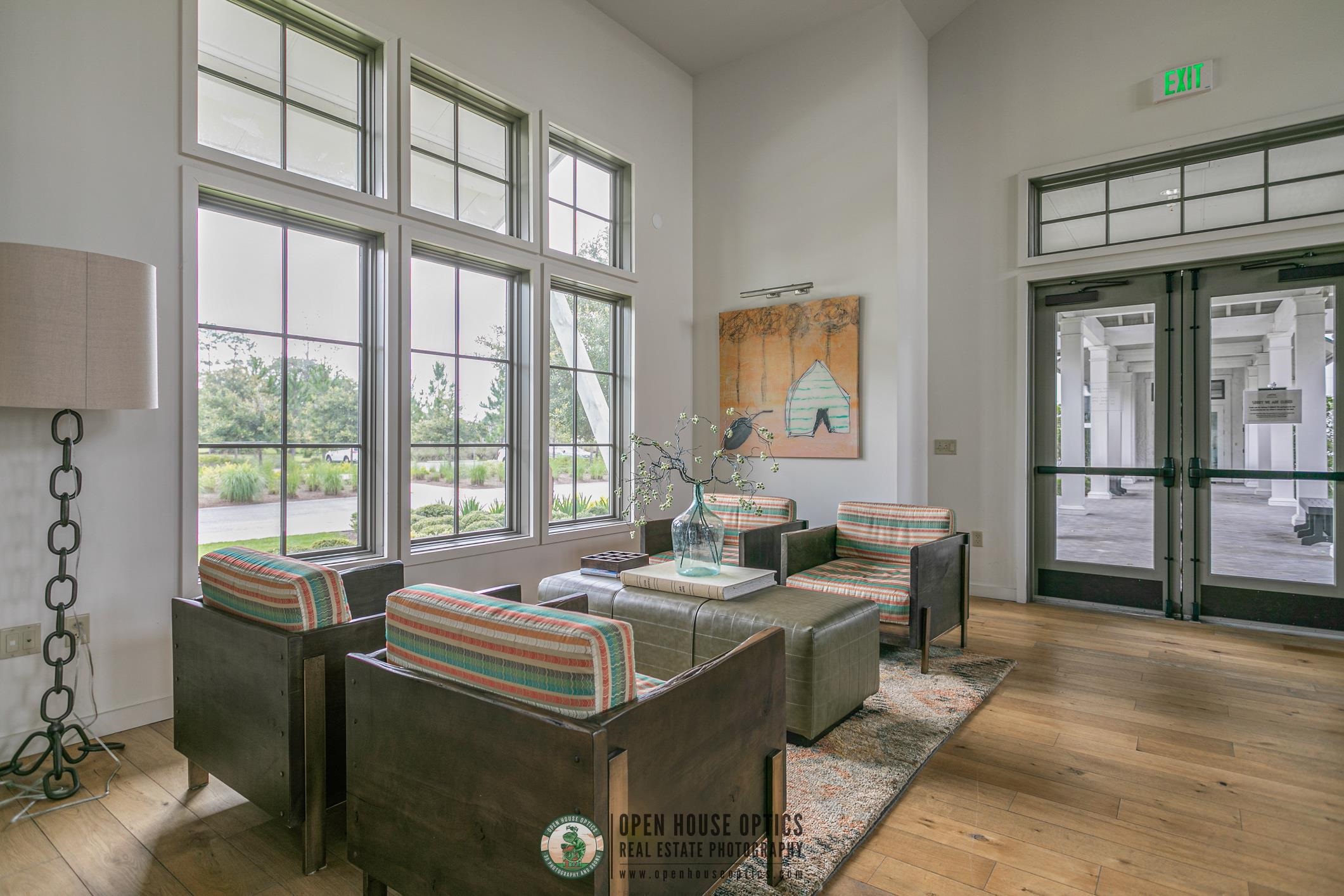 210 White Rabbit Run St. Augustine, FL 32092 - Photo 62 of 85 a living room with furniture and a floor to ceiling window