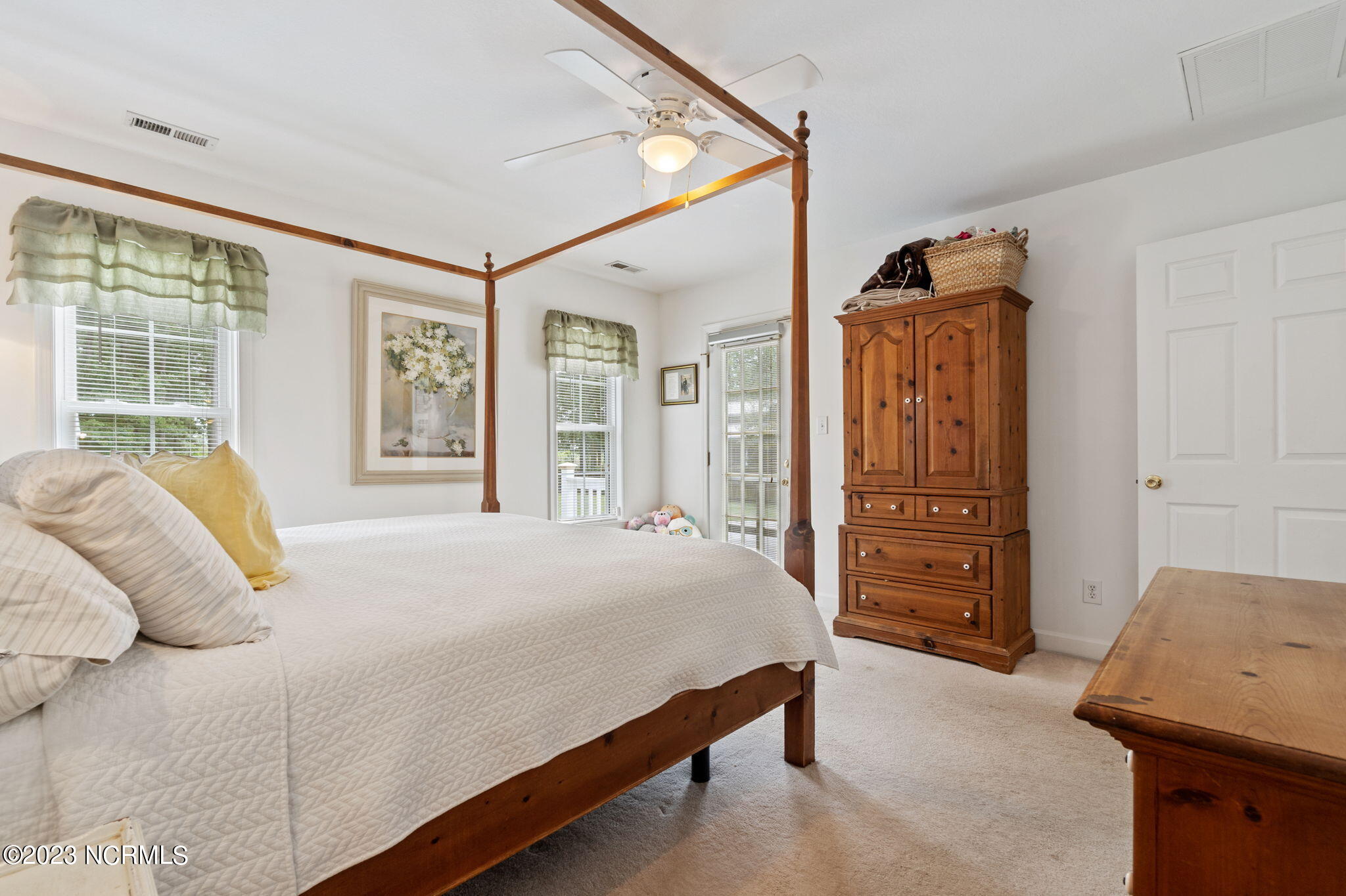 152 Country Club Road Camden, NC 27921 - Photo 21 of 44 Master bedroom with door to deck