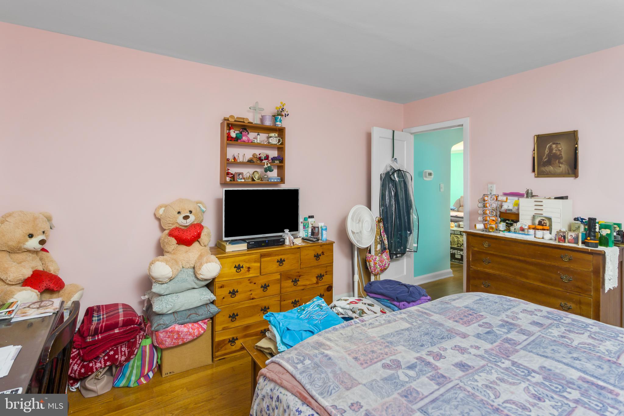 920 Barnt-Deklyn Road Hamilton, NJ 08610 - Photo 12 of 26 a bedroom with furniture and a flat screen tv