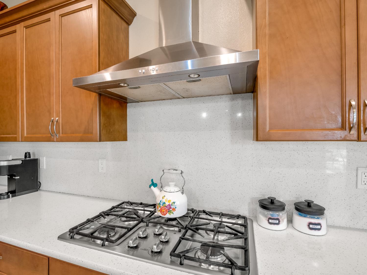 2127 Chennault Avenue Clovis, CA 93611 - Photo 15 of 49 a stove top oven sitting inside of a kitchen