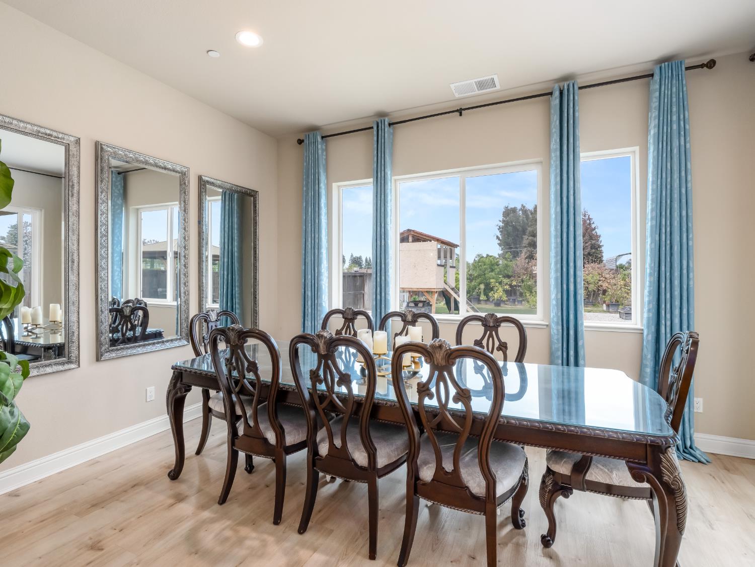 2127 Chennault Avenue Clovis, CA 93611 - Photo 16 of 49 a view of a dining room with furniture window and outside view