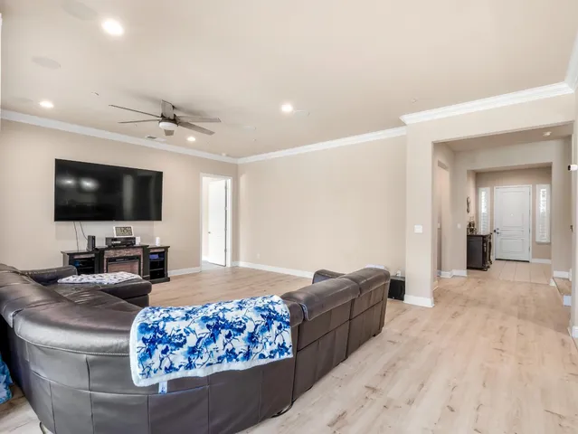 a view of entryway with wooden floor and staircase
