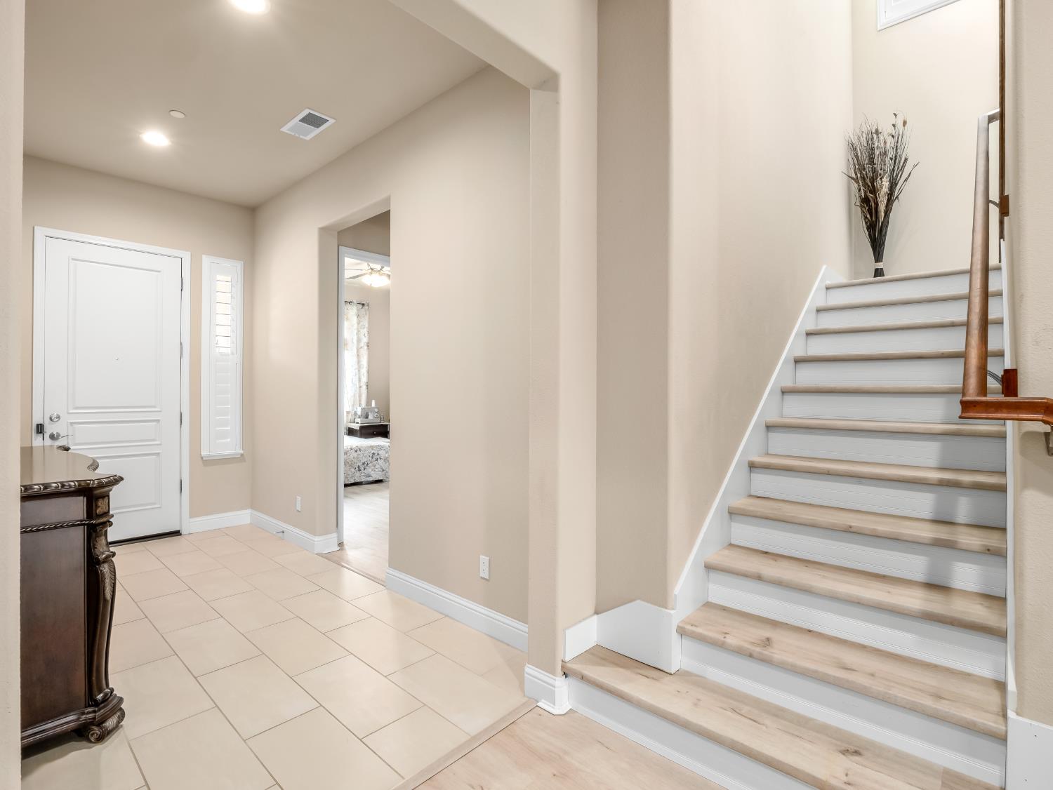 2127 Chennault Avenue Clovis, CA 93611 - Photo 19 of 49 a view of entryway with wooden floor and staircase