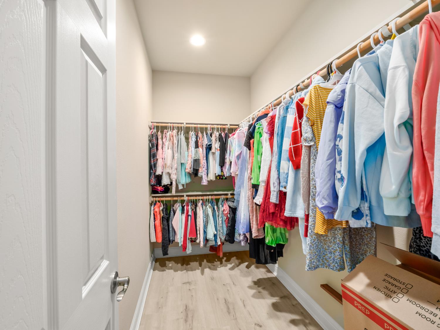 2127 Chennault Avenue Clovis, CA 93611 - Photo 37 of 49 a view of walk in closet with clothes and shoes