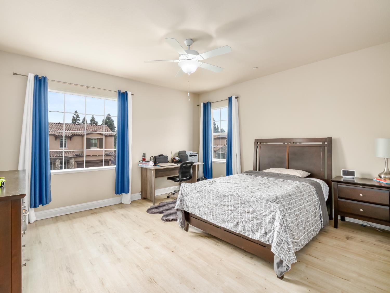 2127 Chennault Avenue Clovis, CA 93611 - Photo 40 of 49 a bedroom with a large bed and a window