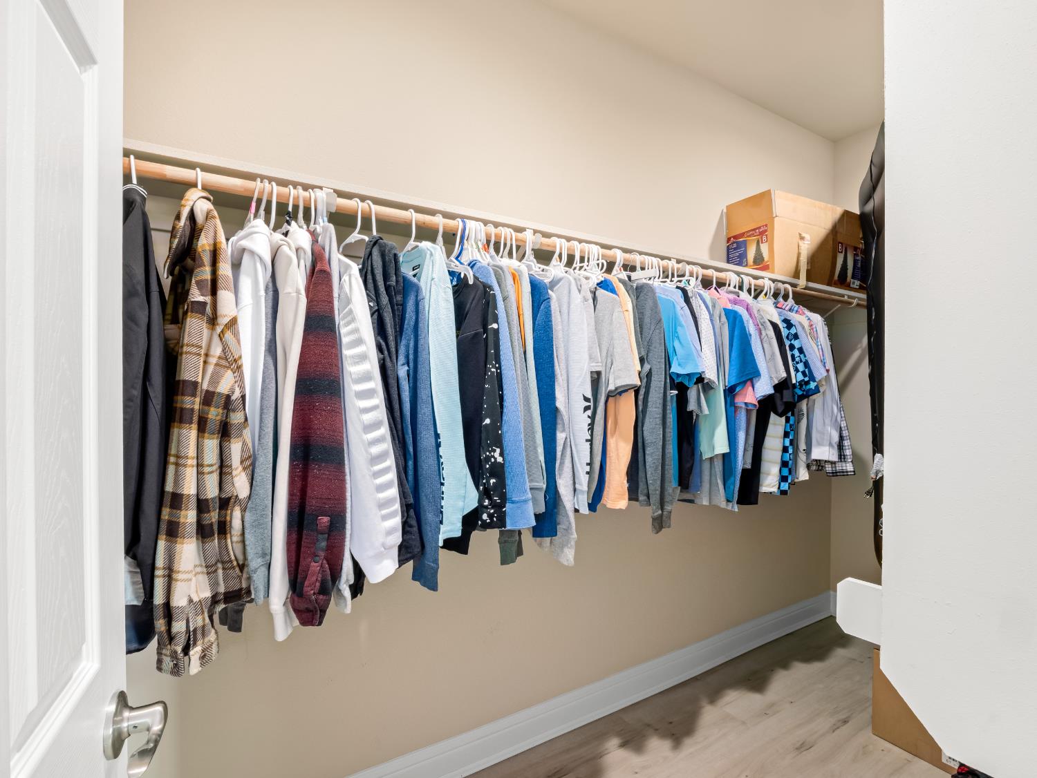 2127 Chennault Avenue Clovis, CA 93611 - Photo 42 of 49 a view of walk in closet with clothes and shoes
