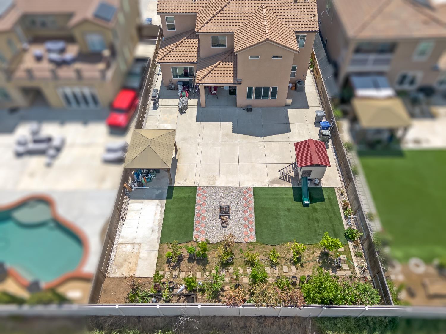 2127 Chennault Avenue Clovis, CA 93611 - Photo 43 of 49 an aerial view of a house with a yard basket ball court and outdoor seating