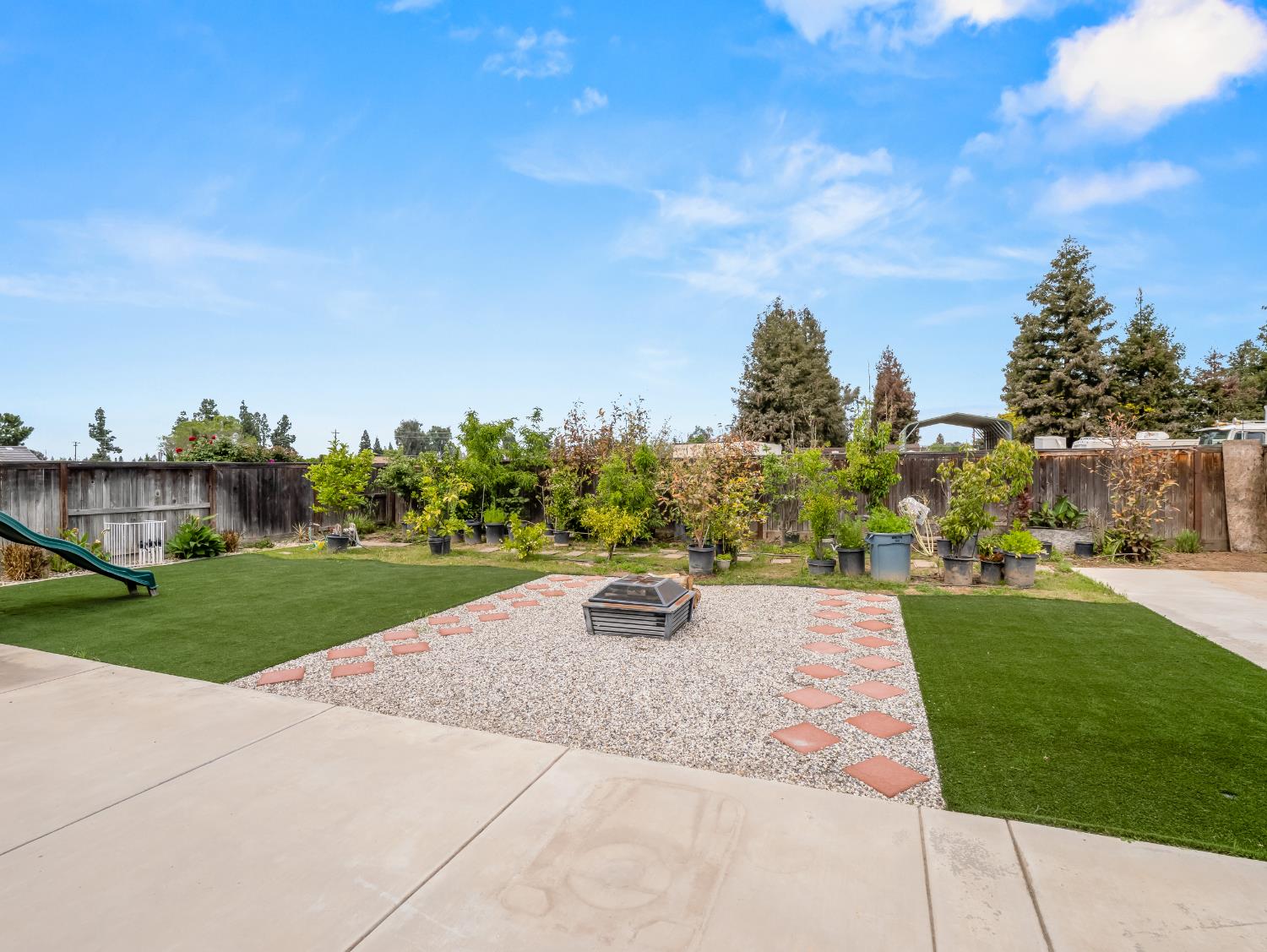 2127 Chennault Avenue Clovis, CA 93611 - Photo 48 of 49 a park view with a garden space