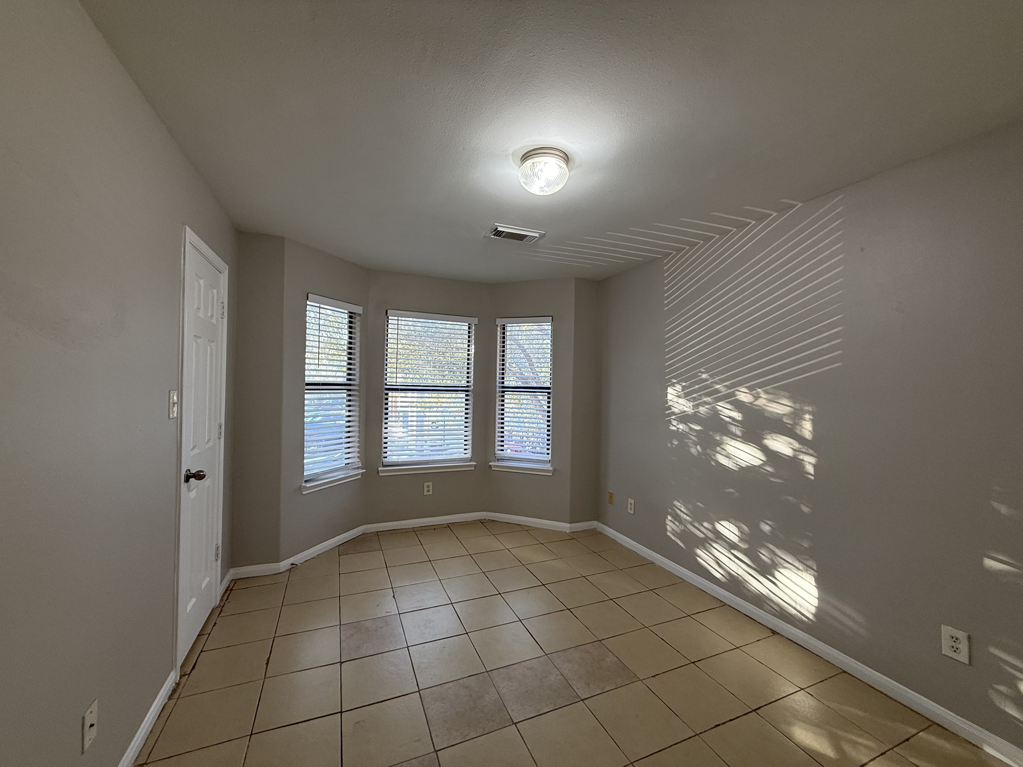 3032 La Estancia Lane Houston, TX 77093 - Photo 27 of 30 a view of an empty room and window