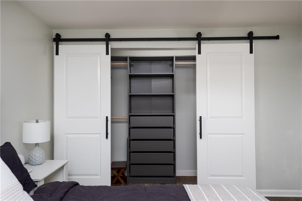 1384 Harmony Road Baden, PA 15005 - Photo 22 of 49 a view of walk in closet with empty racks