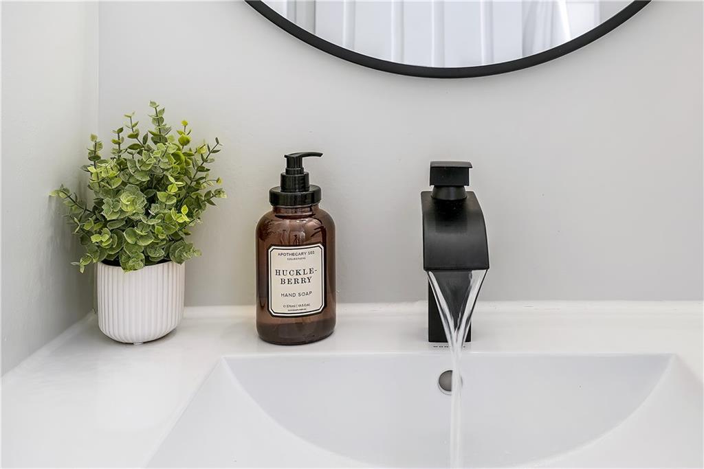 1384 Harmony Road Baden, PA 15005 - Photo 25 of 49 a potted plant sitting on a kitchen counter top