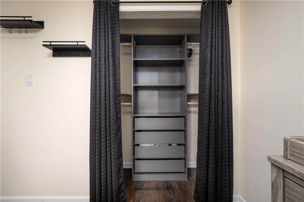 1384 Harmony Road Baden, PA 15005 - Photo 30 of 49 a view of walk in closet with empty racks