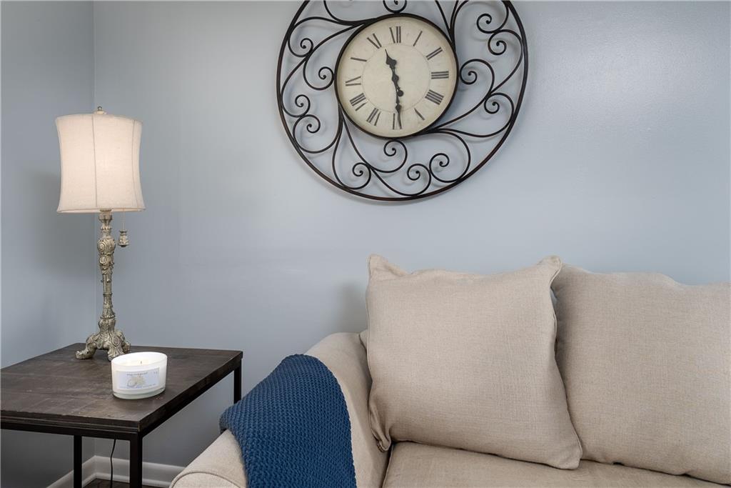 1384 Harmony Road Baden, PA 15005 - Photo 4 of 49 a view of a hallway with paintings on the wall and a wall