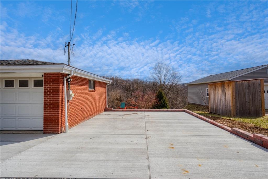 1384 Harmony Road Baden, PA 15005 - Photo 45 of 49 a view of backyard with potted plants