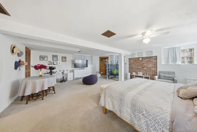 a bedroom with furniture and a couch