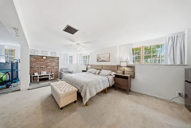 swimming pool view with a seating space