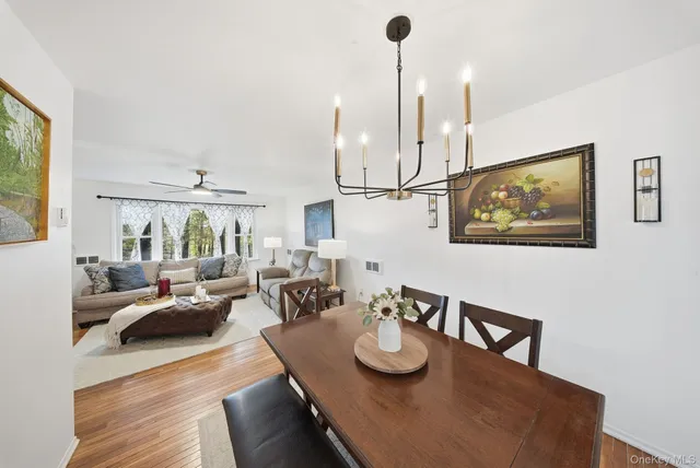 a front view of a house with a yard patio and fire pit