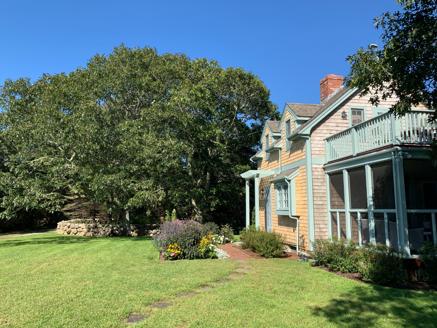 60 Meetinghouse Road Chilmark, MA 02535 - Photo 2 of 23 a view of a house with a yard