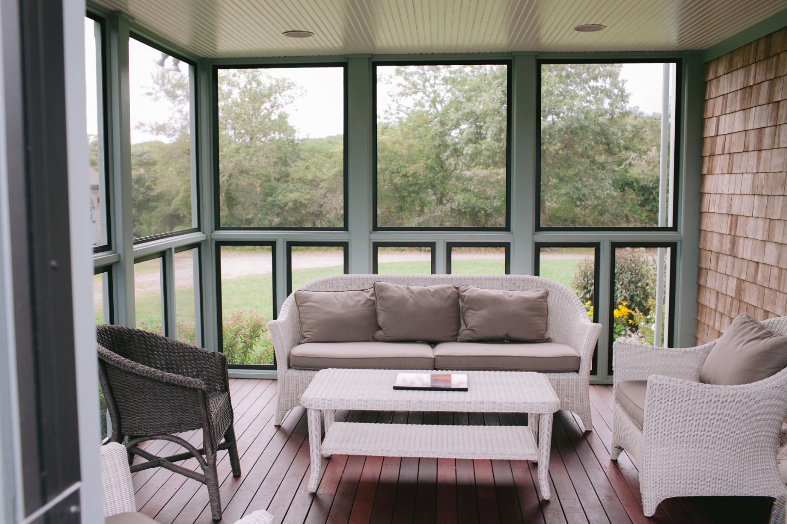 60 Meetinghouse Road Chilmark, MA 02535 - Photo 11 of 23 a living room with furniture and a large window