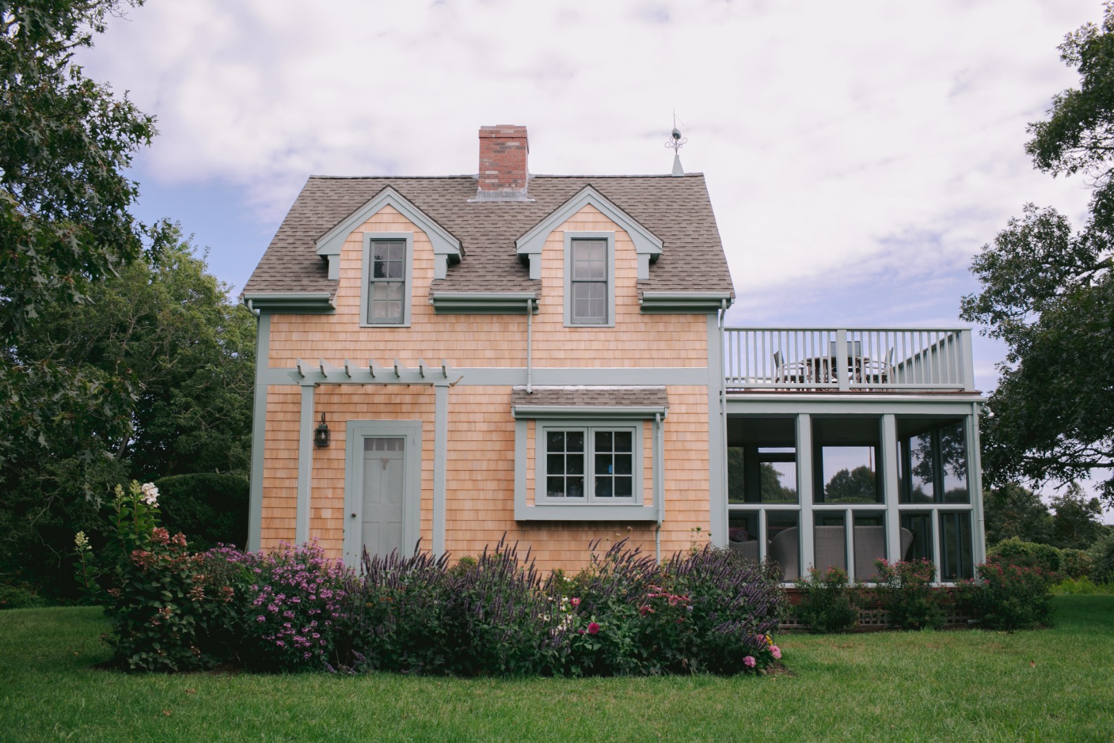 60 Meetinghouse Road Chilmark, MA 02535 - Photo 18 of 23 a view of a white house next to a yard