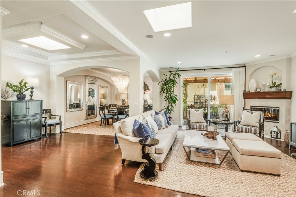 520 Esplanade, Unit D Redondo Beach, CA 90277 - Photo 11 of 24 a living room with furniture or outdoor view and a large window