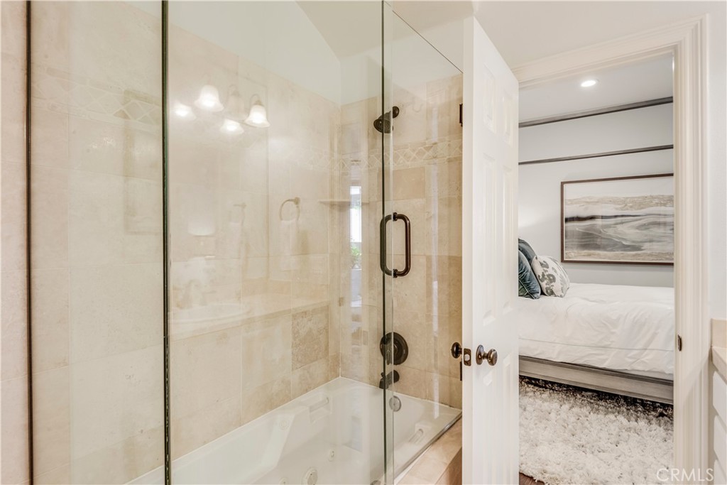 520 Esplanade, Unit D Redondo Beach, CA 90277 - Photo 18 of 24 a bathroom with a shower and a sink