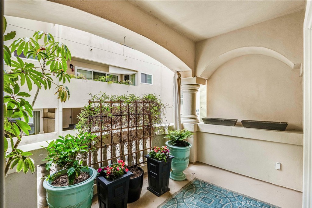 520 Esplanade, Unit D Redondo Beach, CA 90277 - Photo 19 of 24 a view of a potted plants in front of a house