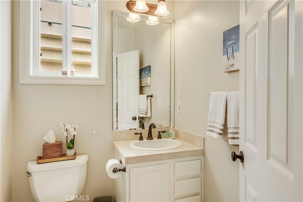 520 Esplanade, Unit D Redondo Beach, CA 90277 - Photo 24 of 24 a bathroom with a sink a toilet and shower