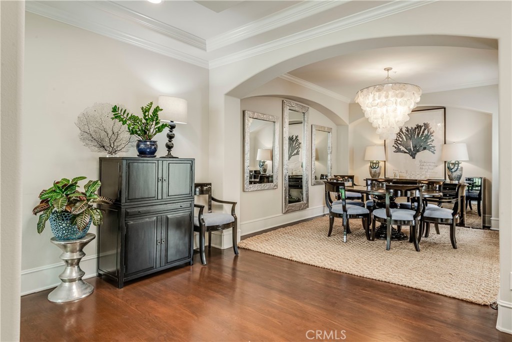 520 Esplanade, Unit D Redondo Beach, CA 90277 - Photo 9 of 24 a living room with furniture dining room and a chandelier