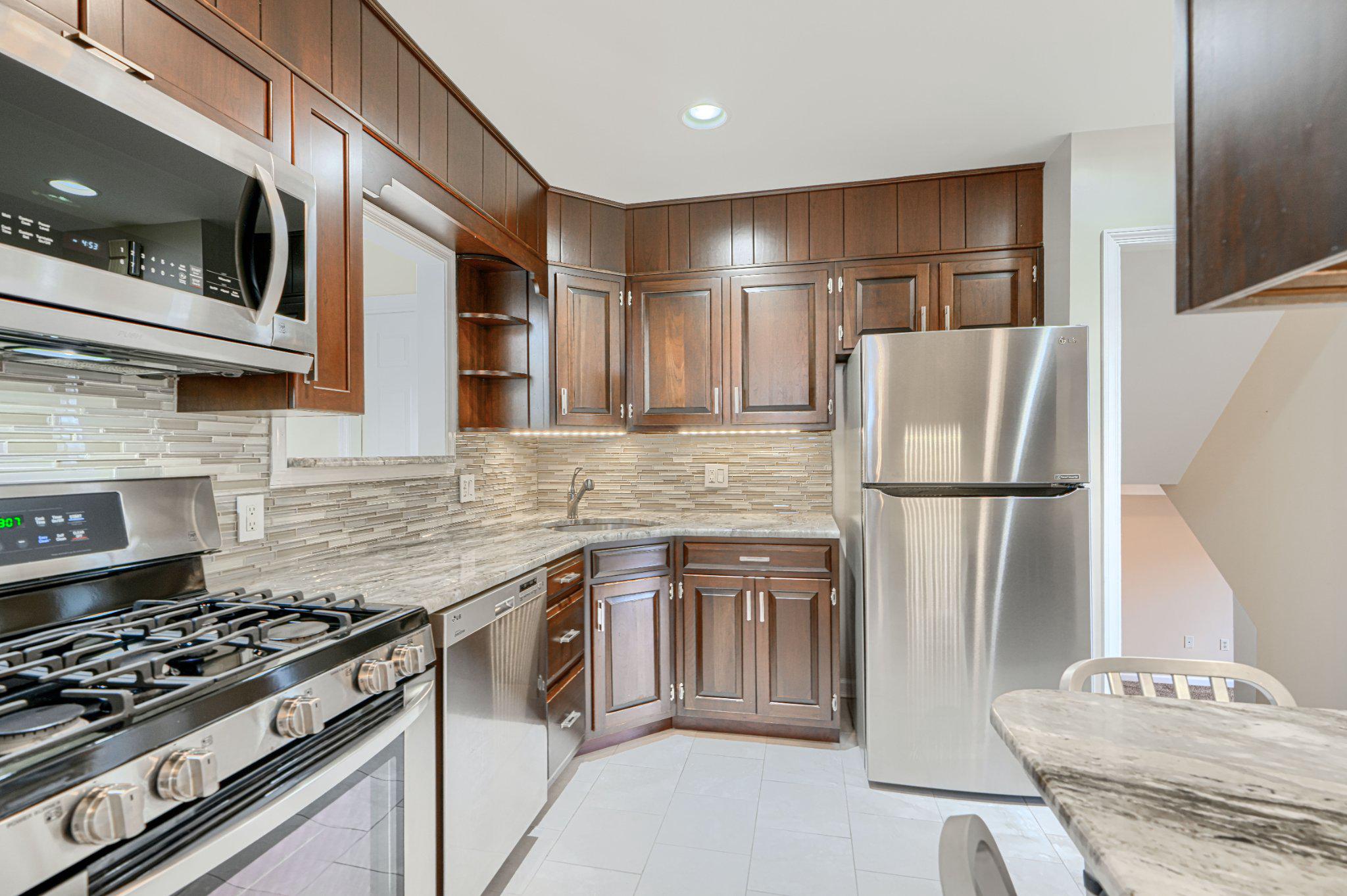 8 Felton Road Lutherville-Timonium, MD 21093 - Photo 18 of 42 Updated kitchen with sleek finishes.