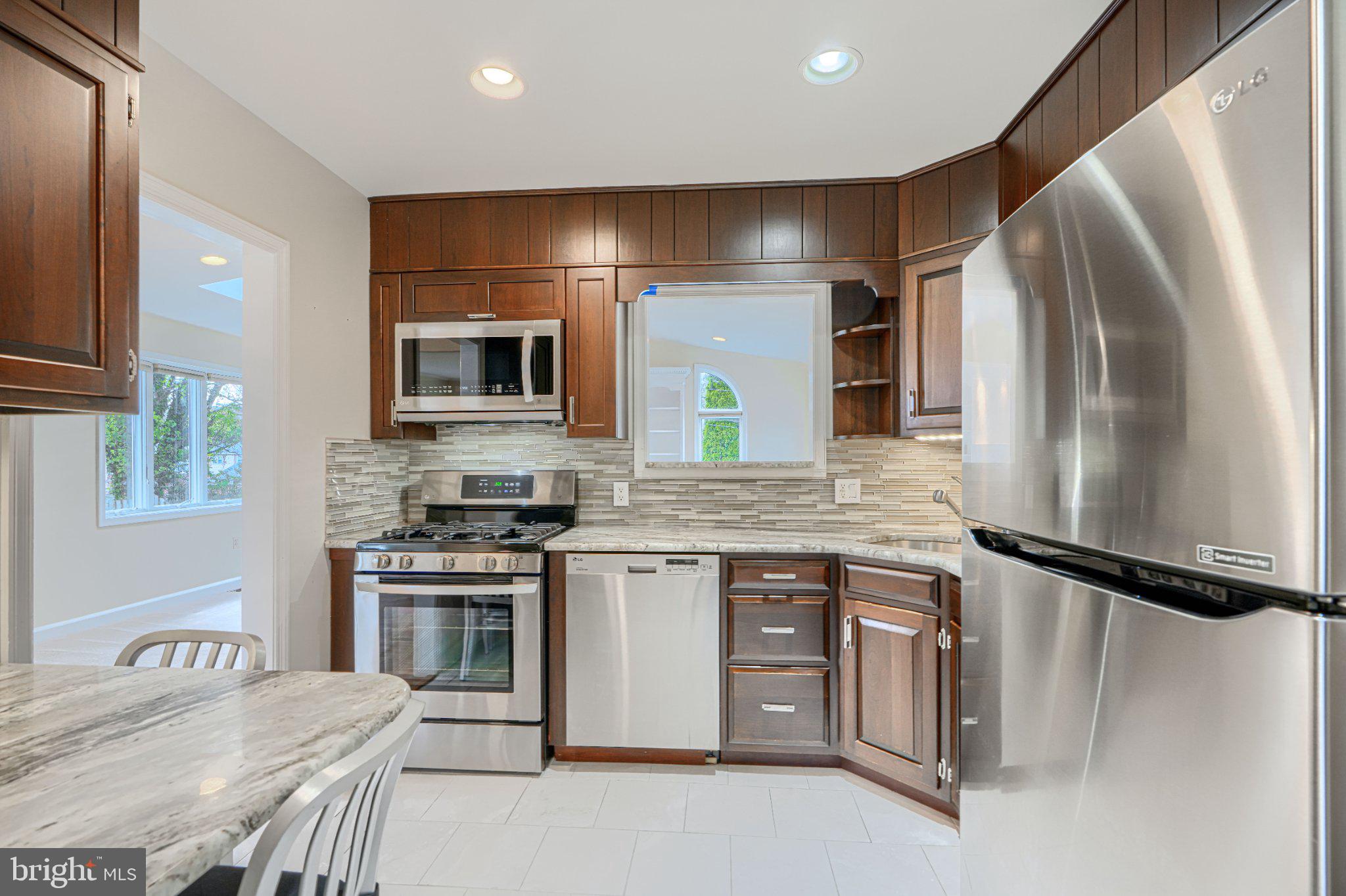 8 Felton Road Lutherville-Timonium, MD 21093 - Photo 19 of 42 Modern kitchen with sleek finishes.