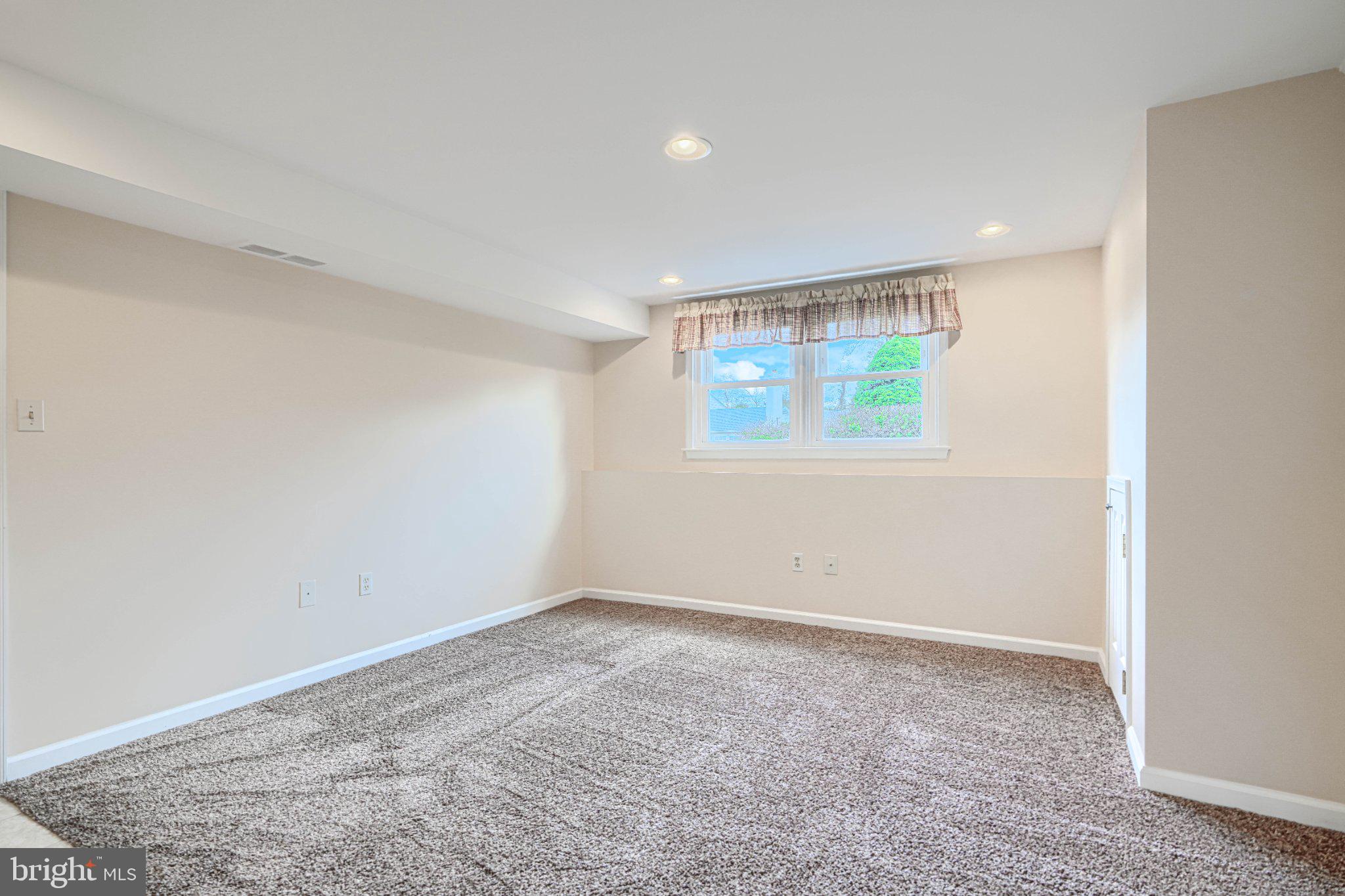 8 Felton Road Lutherville-Timonium, MD 21093 - Photo 34 of 42 Bright and inviting basement retreat.