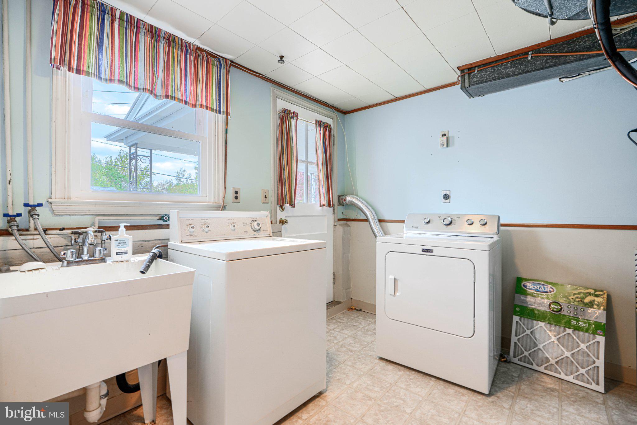 8 Felton Road Lutherville-Timonium, MD 21093 - Photo 38 of 42 Bright and functional laundry space.