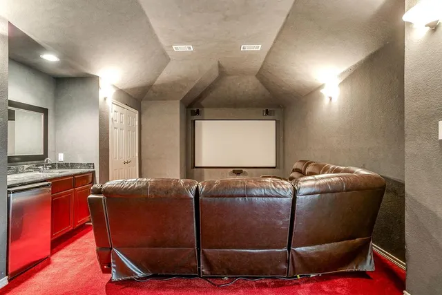 a room with a couch and wooden floor