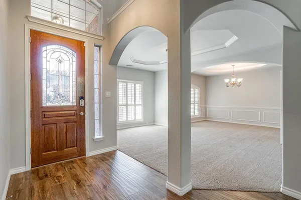 a view of livingroom with hardwood floor and hallway